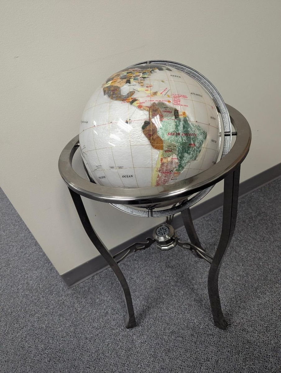 Stone Globe of world on metal stand spins 3 feet tall