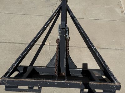 Skid steer boom attachment