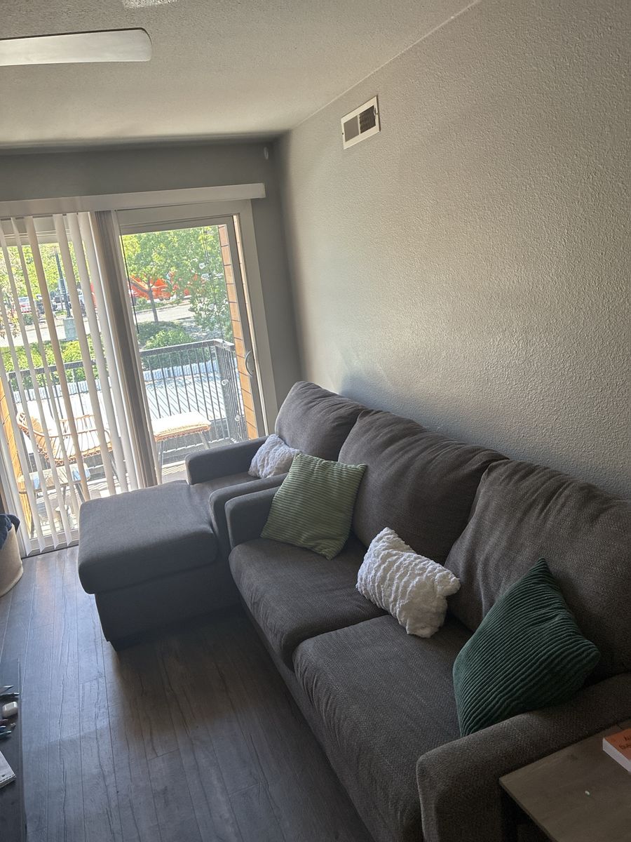 Spacious Beige Sectional Sofa with Reversible Chaise - Excellent Condition