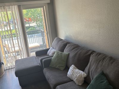 Spacious Beige Sectional Sofa with Reversible Chaise - Excellent Condition