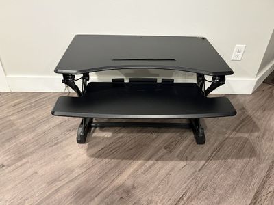 Black standing desk, table top