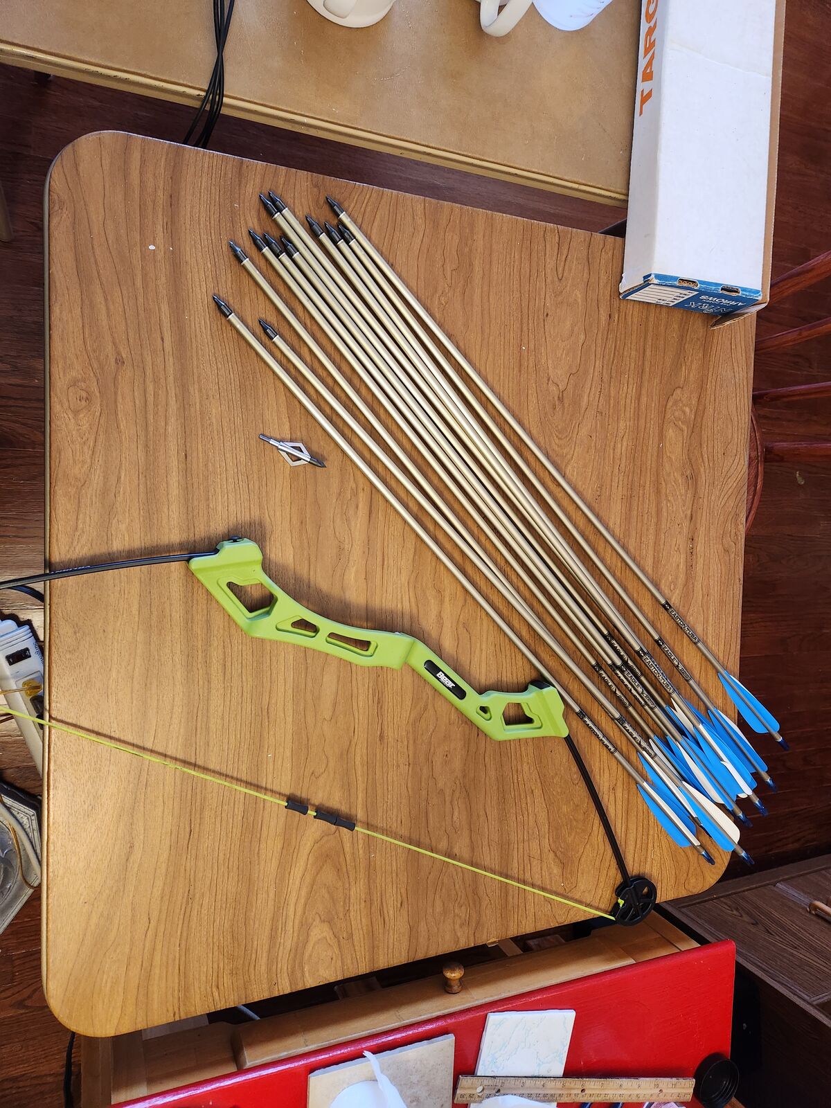 One dozen new Easton Eagle 2219 aluminum arrows 34", one extra spade tip...and a kid's Bear Valiant bow