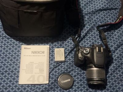 Canon EOS Rebel T3 DSLR Camera with EF-S 18-55mm IS Lens, Bag