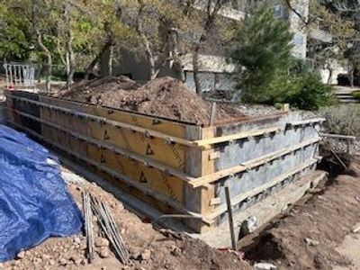 Concrete Foundations | Footings | Stem Walls | Walkout Basements | Concrete Slabs | Foundation Contractor