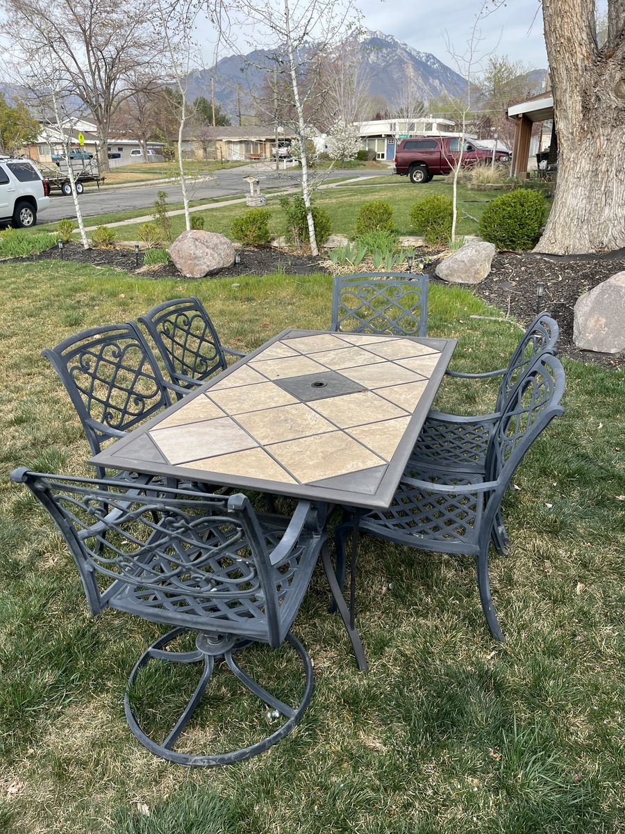 9-piece patio dining set with tile table