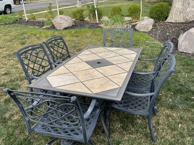 9-piece patio dining set with tile table