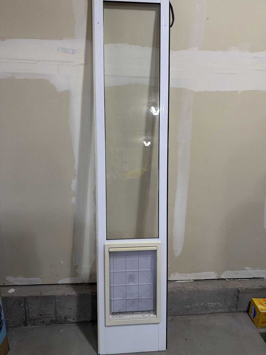 Sliding glass dog door