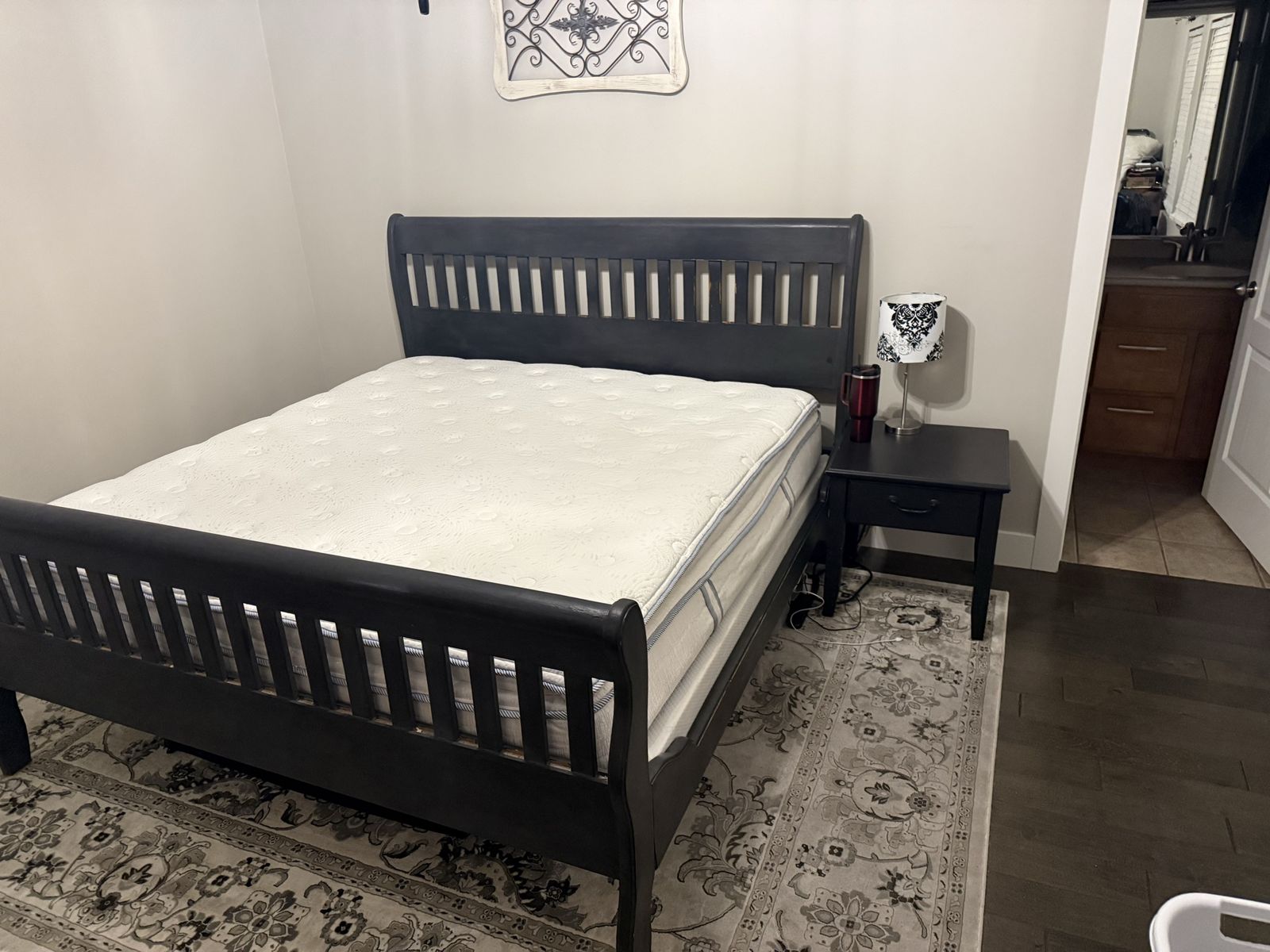 Dark Wood King Sleigh Bed Frame with Slatted Headboard and Footboard - Mattress nightstand and rug included.