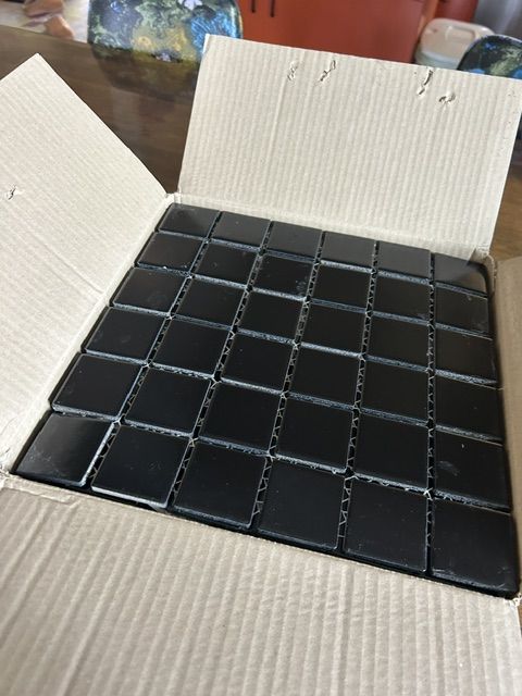 full box of 2"x2" black tiles