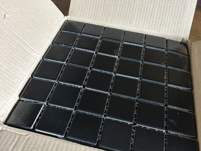 full box of 2"x2" black tiles