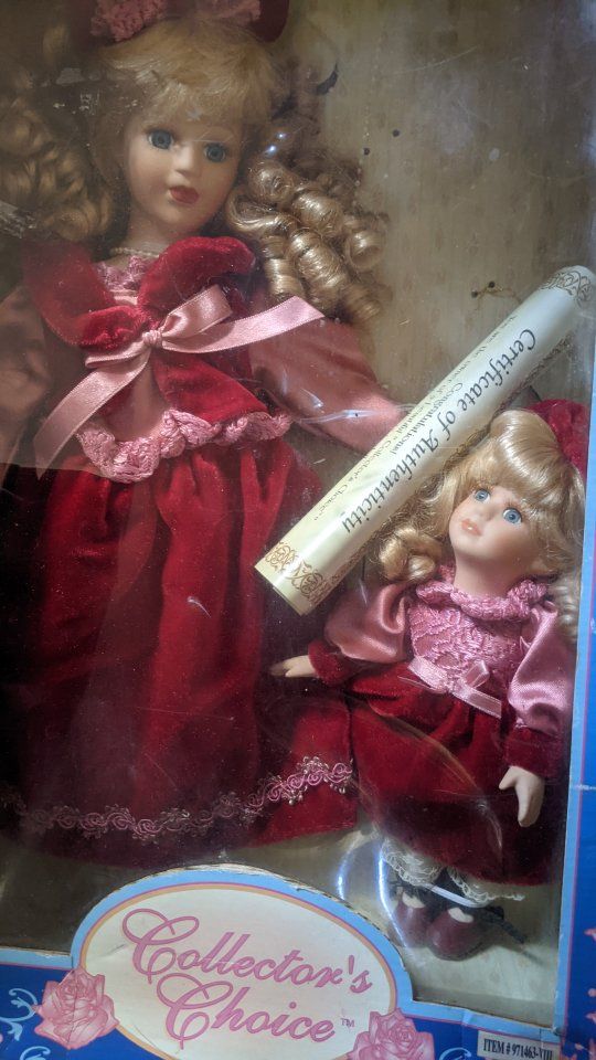 Genuine Fine Besque Porcelain Dolls
