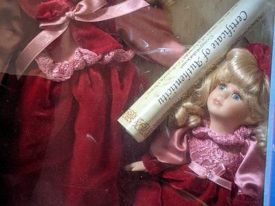 Genuine Fine Besque Porcelain Dolls