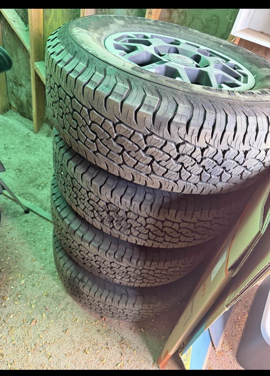 4 BFGoodrich All-Terrain T/A Tires 275/75R18 TRD with Rims.