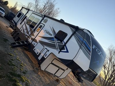 2021 Keystone Fuzion 419 Toy Hauler w/15’ garage