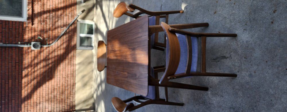 Dinner table and four padded chairs