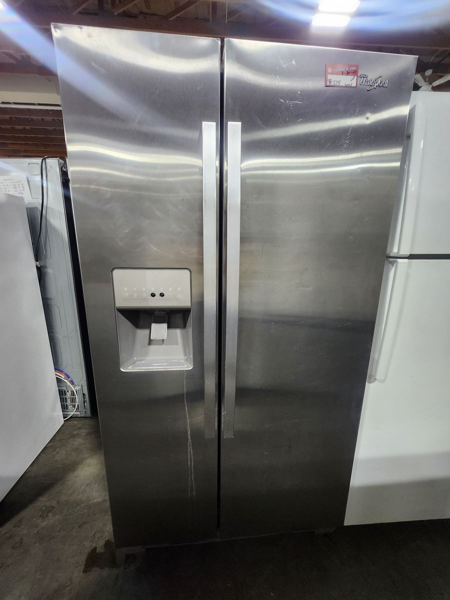 GREAT WHIRLPOOL STAINLESS STEEL SIDE BY SIDE FRIDGE! W-WARRANTY