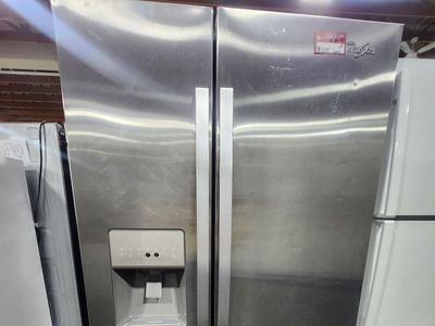 GREAT WHIRLPOOL STAINLESS STEEL SIDE BY SIDE FRIDGE! W-WARRANTY