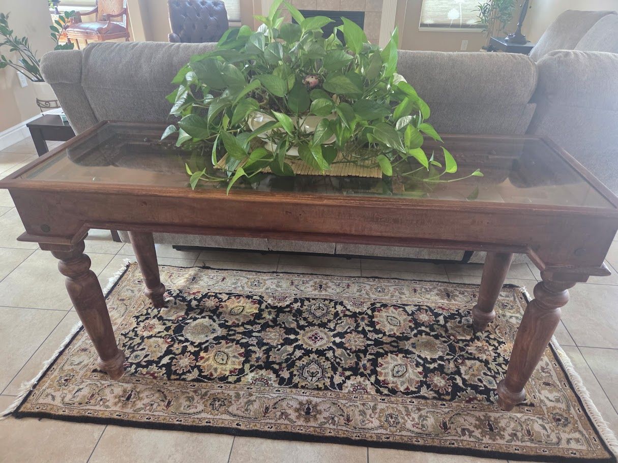 Carved Wood side table with glass top