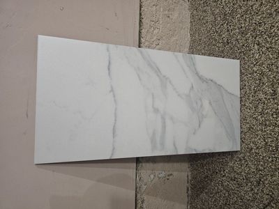 60sf , 24" x 12" porcelain tile