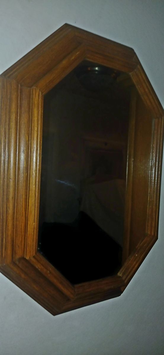 Octagon shaped mirror in wood frame