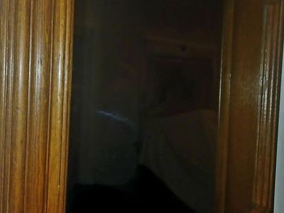 Octagon shaped mirror in wood frame