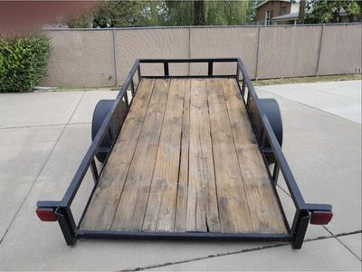Single Axle Tilt Utility Trailer with Wooden Deck and Steel Frame