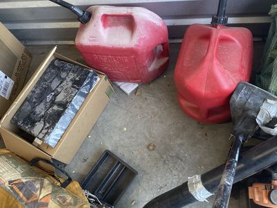 3- 5 gallon gas jugs