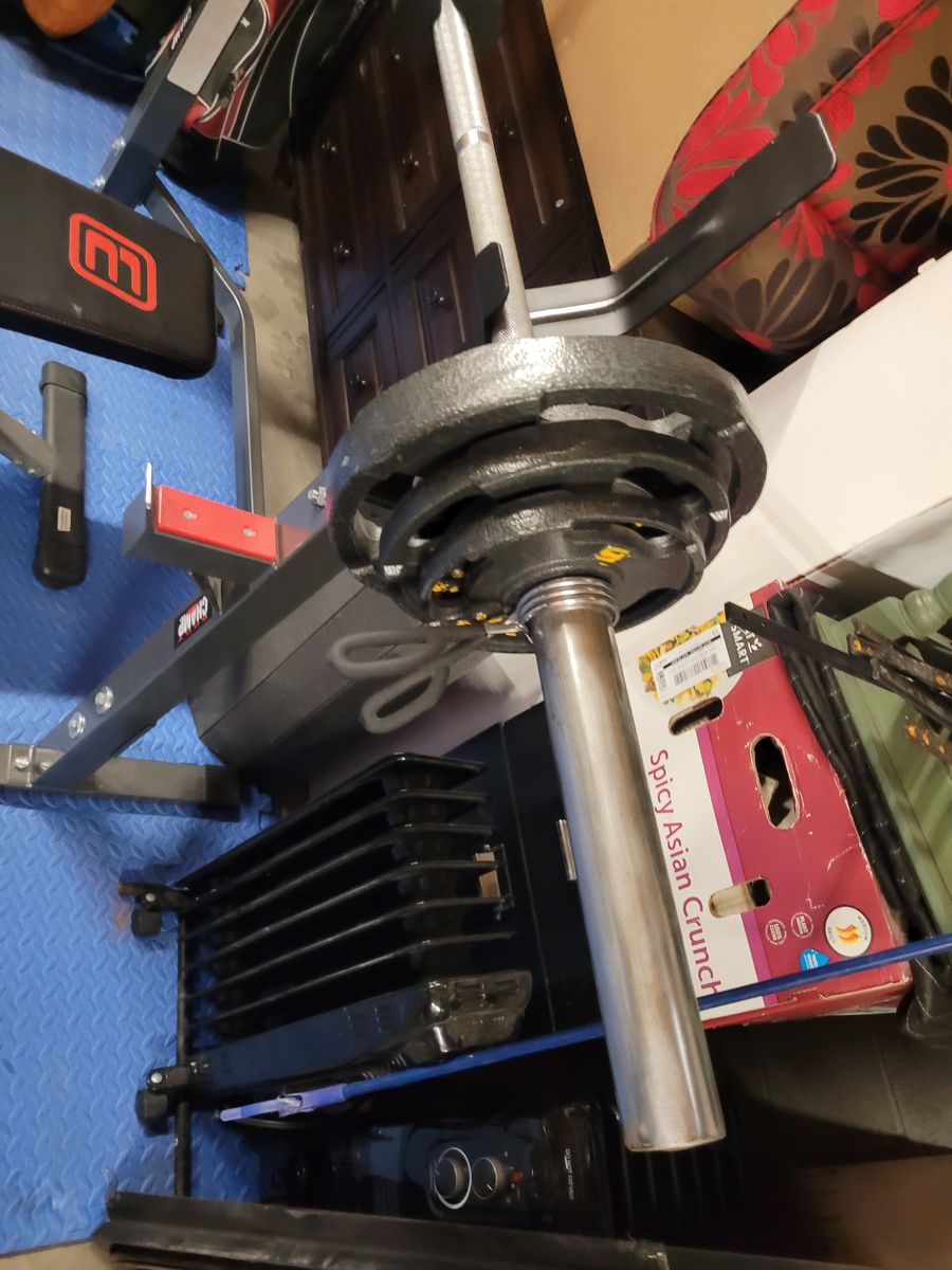 Olympic barbell, weights, rack and bench