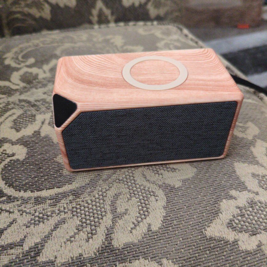 Wireless Charging Bluetooth Speaker