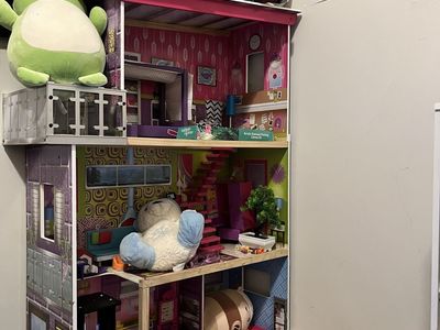 Large Wooden Dollhouse with Multiple Rooms and Balcony