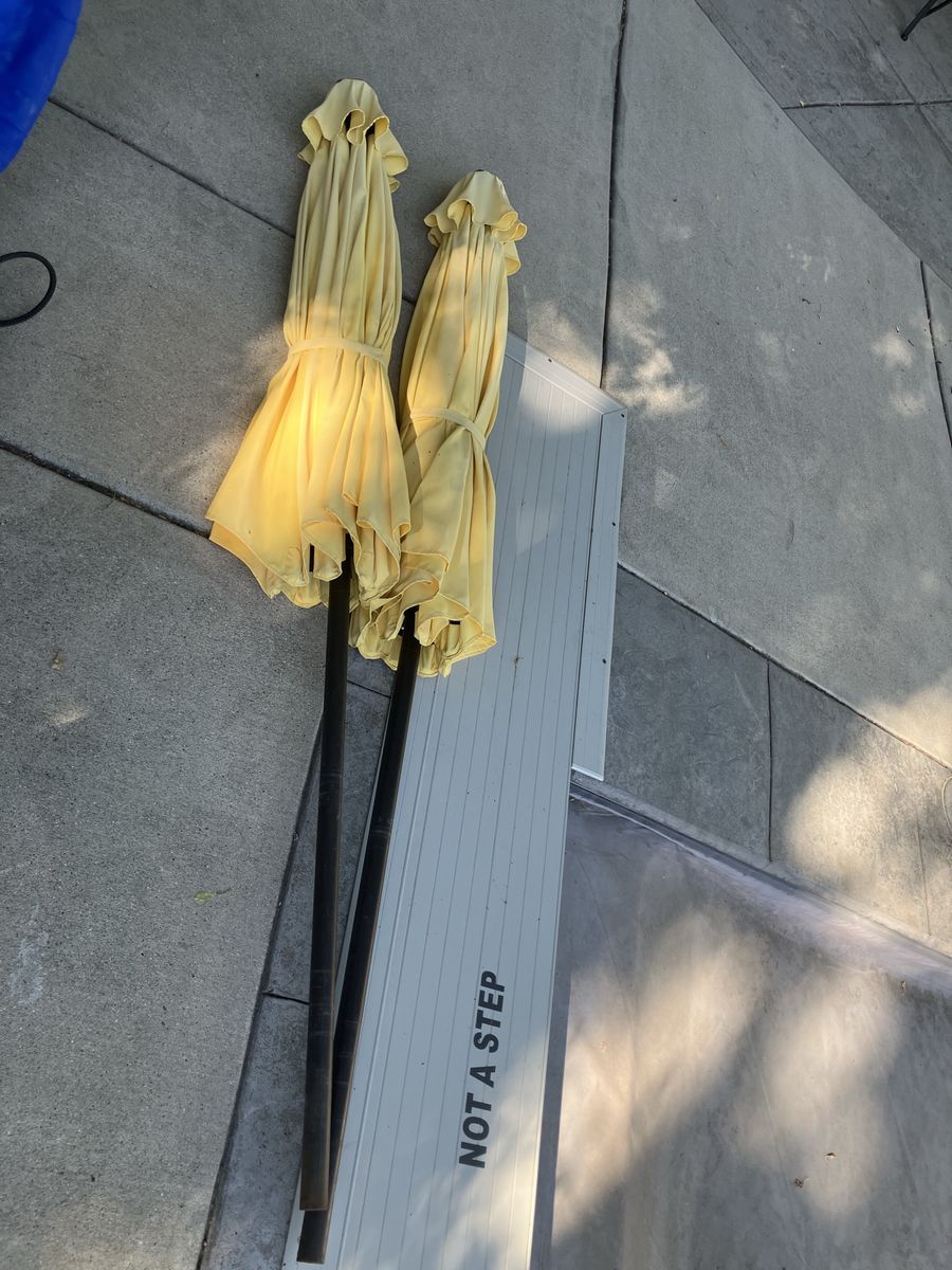2 patio umbrellas