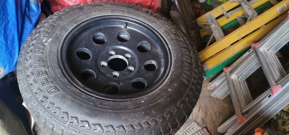 215/75R15 set of 4 all terrain tires with rim included