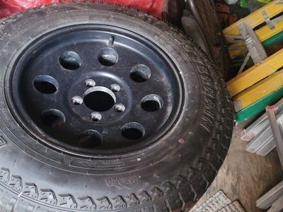 215/75R15 set of 4 all terrain tires with rim included