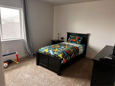 Twin Size Kids Bed (small tear in mattress)