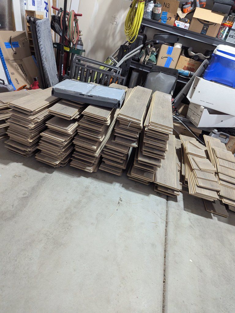 Used Laminate Wood Flooring Planks - Gray/Brown Finish - Excellent condition