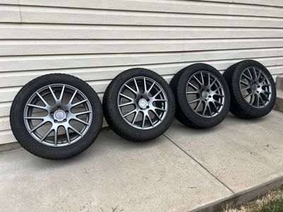 Set of 4 225/55R18 Blizzak tires with rims